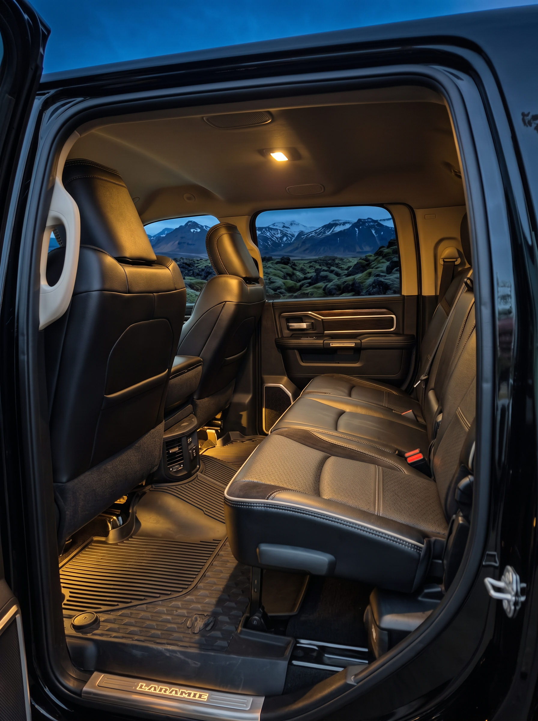 Rear leather passenger cabin of the RAM 3500 with Icelandic mountains outside